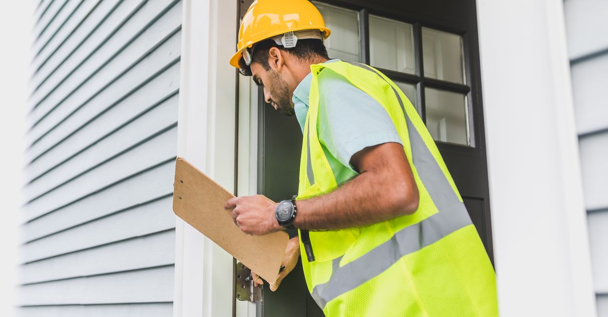 locksmith hands door — Houston Pro Locksmith